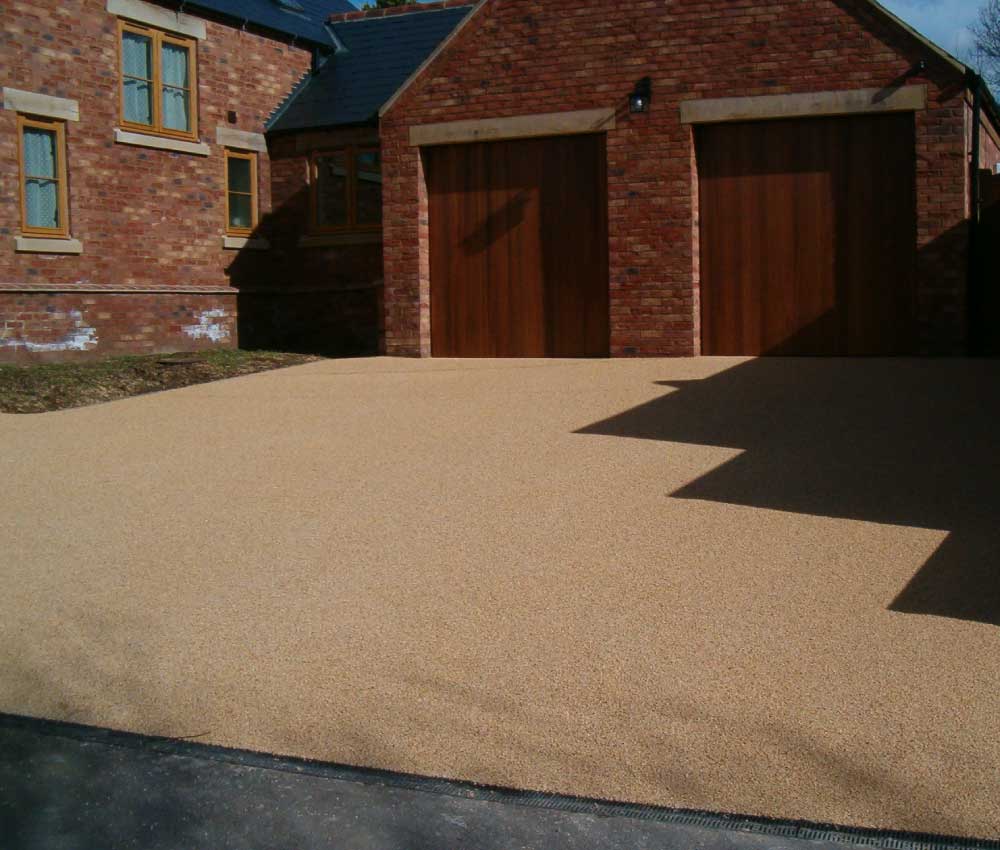 Resin Bound Gravel Driveway With Garage Doors